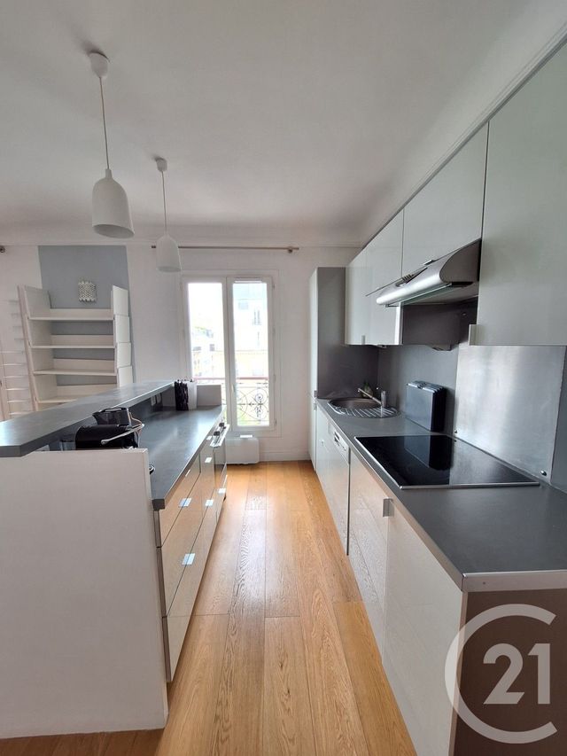 Afficher la photo en grand Appartement à louer - 2 pièces - 55,72 m2 - Paris - 75015 - ILE-DE-FRANCE